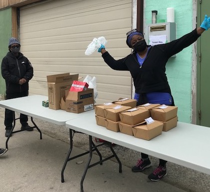 Staff serving Community Meal